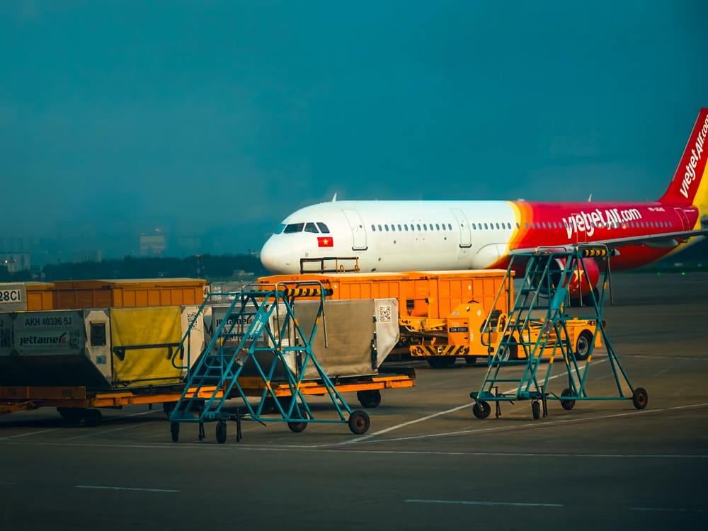 Aircraft being loaded with freight at an air cargo terminal